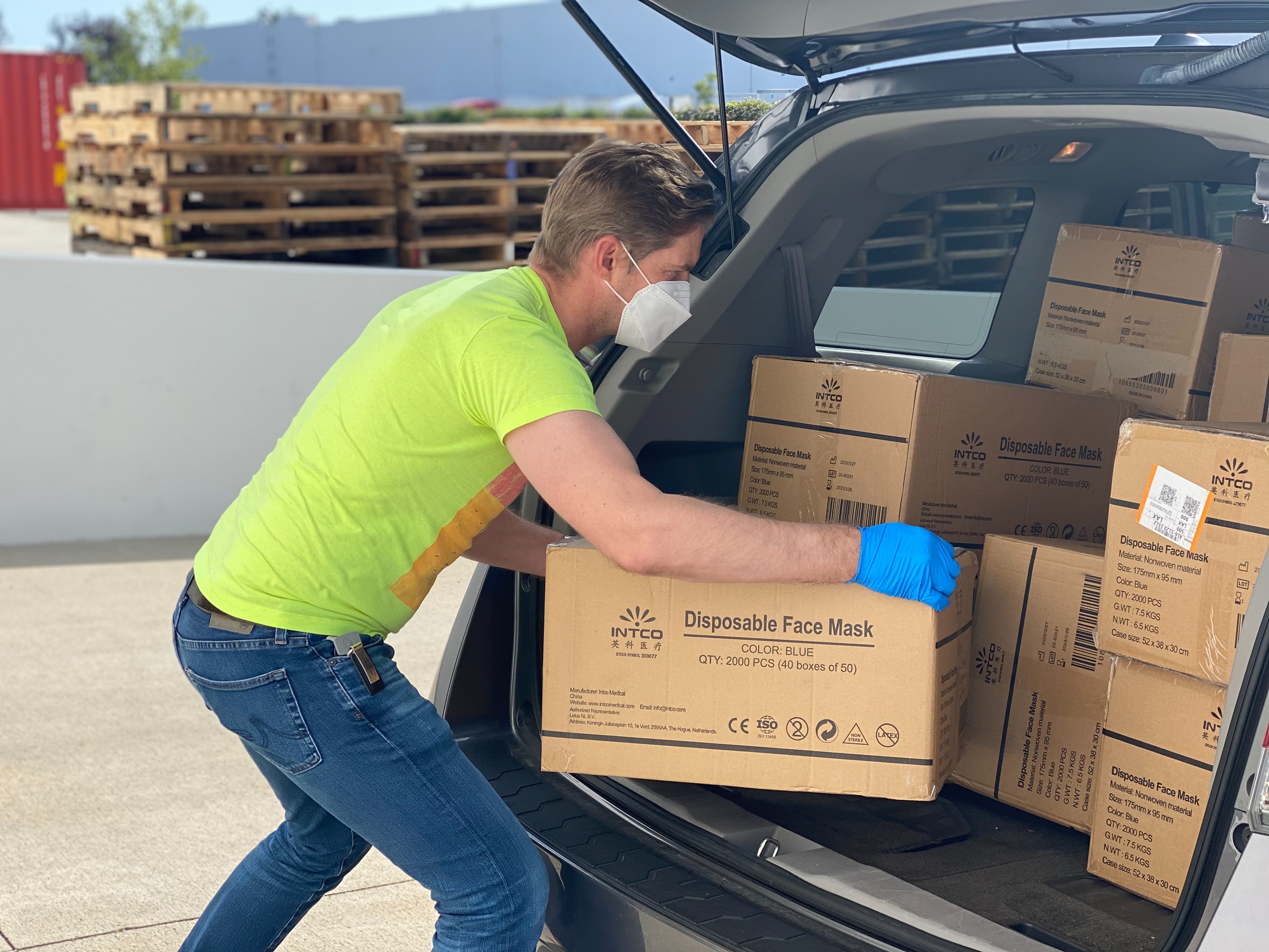 man unloading boxes